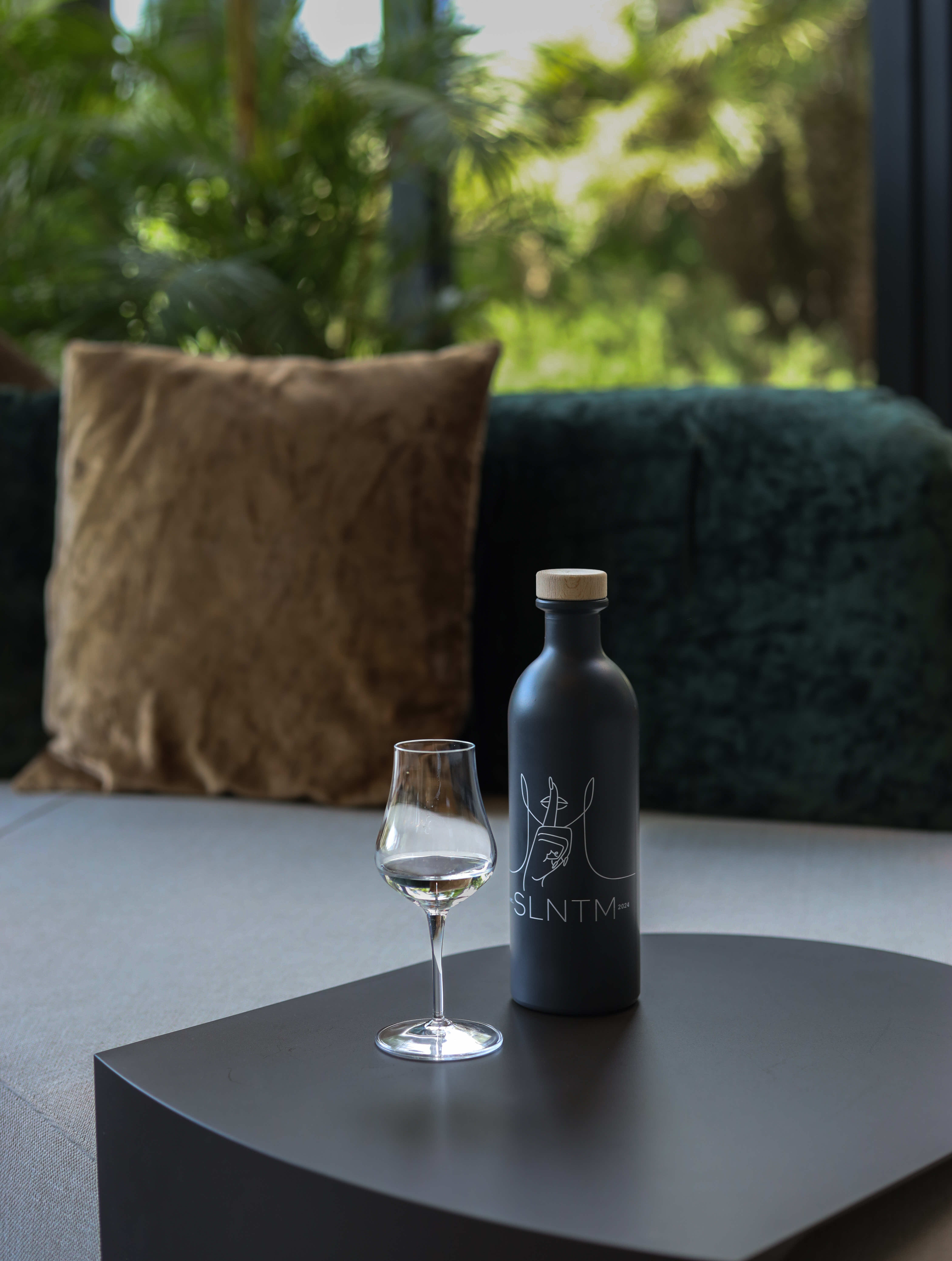 Botanicals used in SLNTM Gin: juniper, pink pepper, Erba Cola